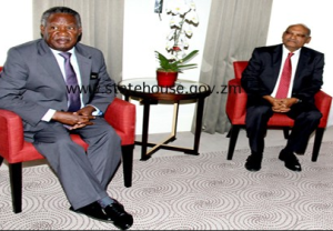 Agarwal and Zambian President Michael Sata in March 2012, London.