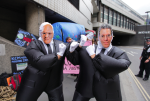 Tom Albanese and Anil Agarwal fight outside the AGM