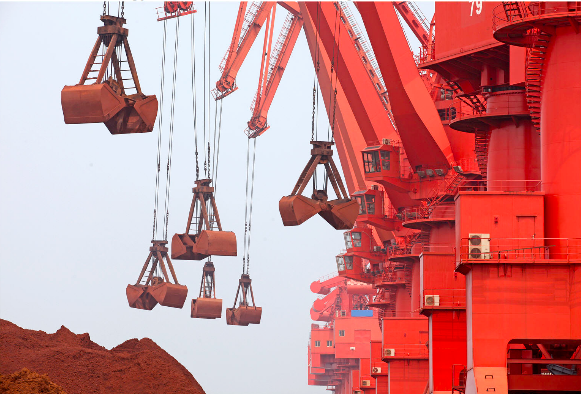 modern technology: Australian iron ore being loaded onto ships