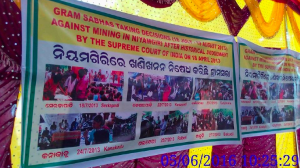 Banner celebrating the referendums at 12 villages