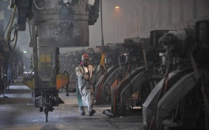 A worker at Alcoa's smelter